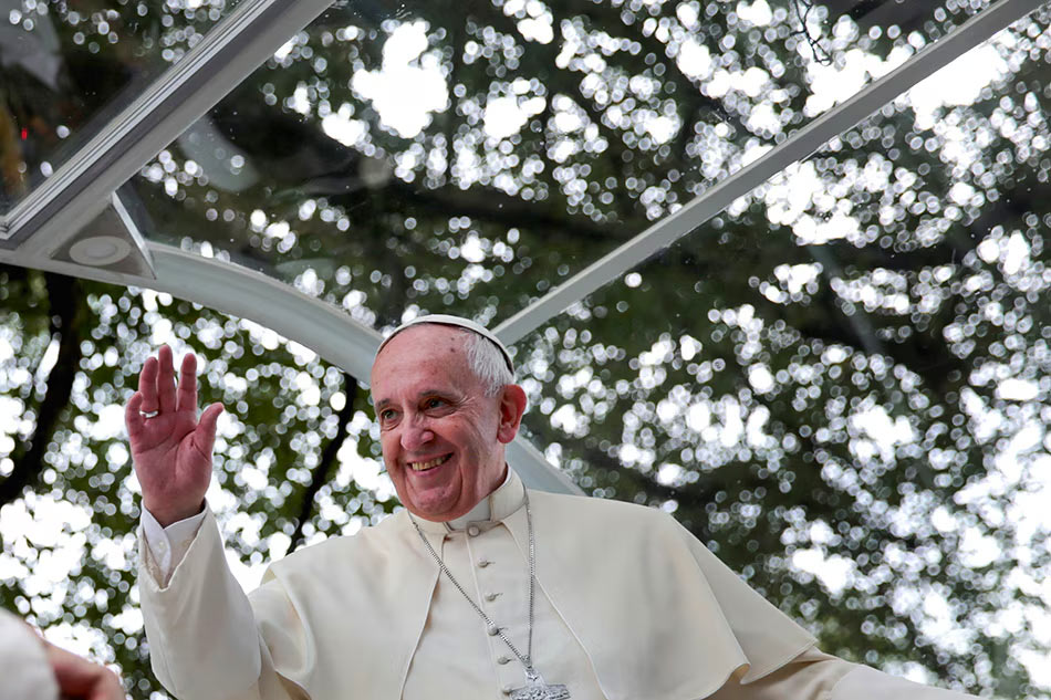 His Holiness Pope Francis departs Malacañan Palace aboard a Pope Mobile after the Welcome Ceremony for the State Visit and Apostolic Journey to the Republic of the Philippines on January 16, 2015. Benhur Arcayan, Malacañang Photo Bureau